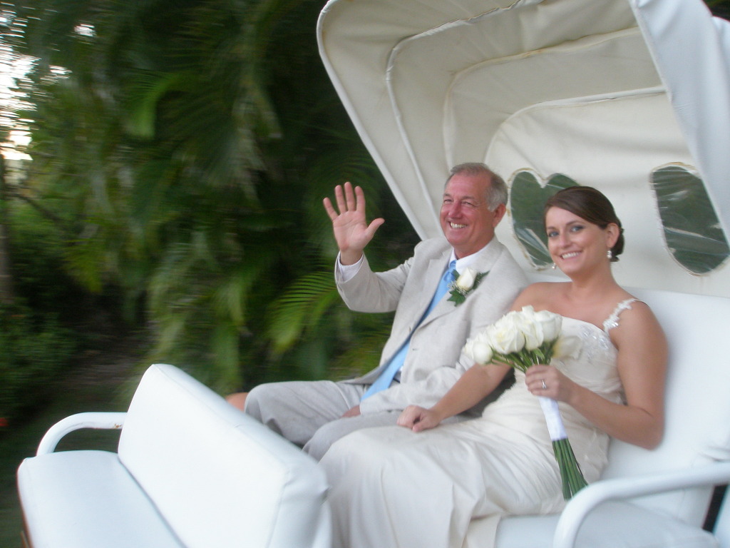 Father of the Bride and Bride on a Horse-Drawn Carriage at Excellence Punta Cana