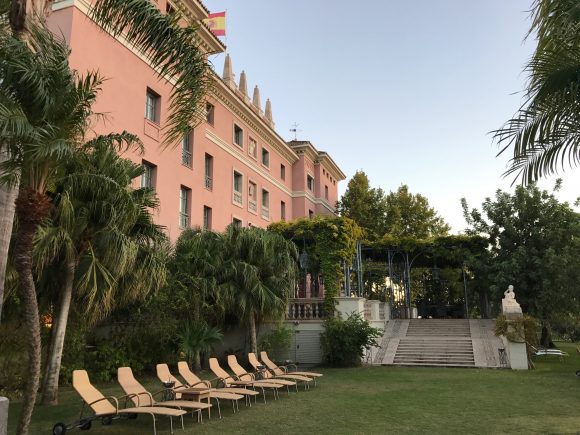 The outdoor seating area of La Veranda Restaurant - Villa Padierna Palace Hotel