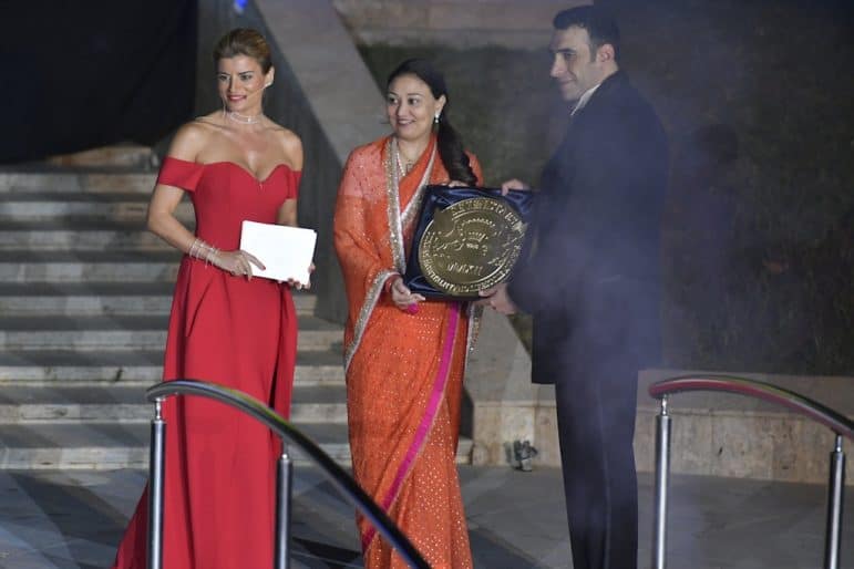 Khalil El-Mouelhy , Chairman President/Founder of the Seven Stars Luxury Hospitality and Lifestyle Awards presenting the award to Princess Bhargavi Kumari Mewar for the Shiv Niwas Palace