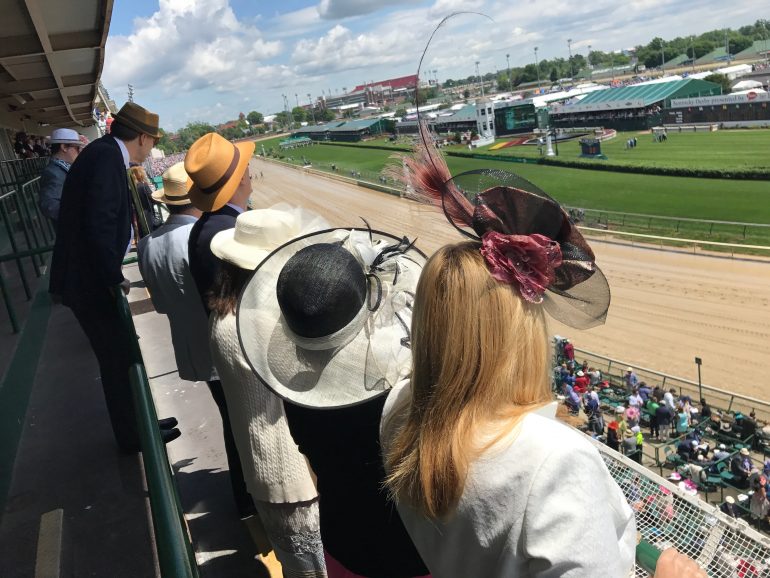 Waiting for the next race on the 4th Floor railing of the 143rd Kennedy Derby