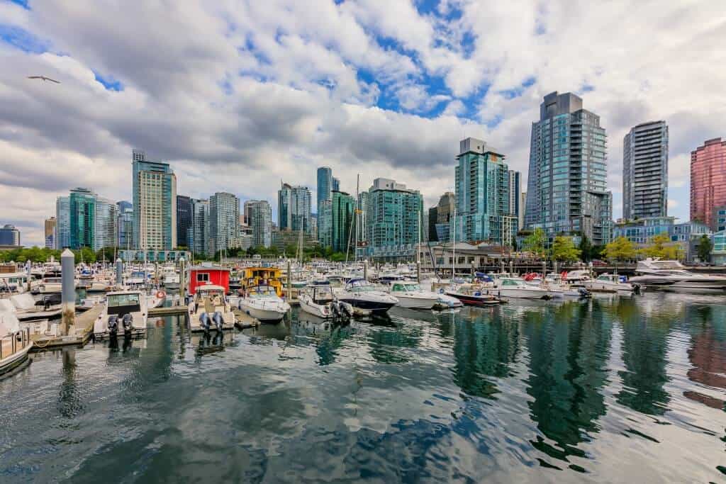 Coal Harbor in Vancouver British Columbia with downtown buildings 