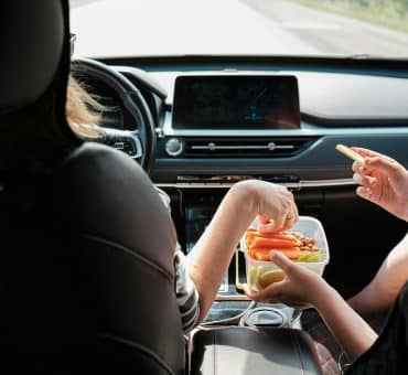 The Travel Snacks People Reach For When Long Days Demand A Little Comfort