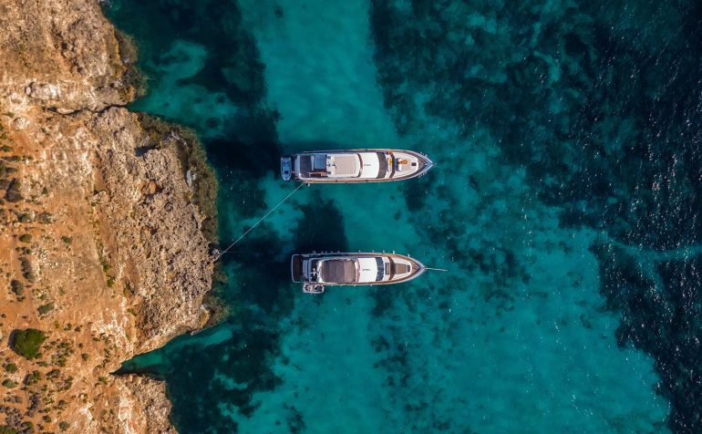 Photo by <a href="https://unsplash.com/@pixelcore?utm_source=unsplash&utm_medium=referral&utm_content=creditCopyText">Mike Nahlii</a> on <a href="https://unsplash.com/photos/two-white-boats-on-teal-water-at-daytime--Jgj_DGd7D8?utm_source=unsplash&utm_medium=referral&utm_content=creditCopyText">Unsplash</a> 